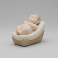 Pop Minimalist Nativity Baby Jesus Figurine in Manger Smooth Rounded Sculpture Modern Religious Decor Collectible Minimal Design
